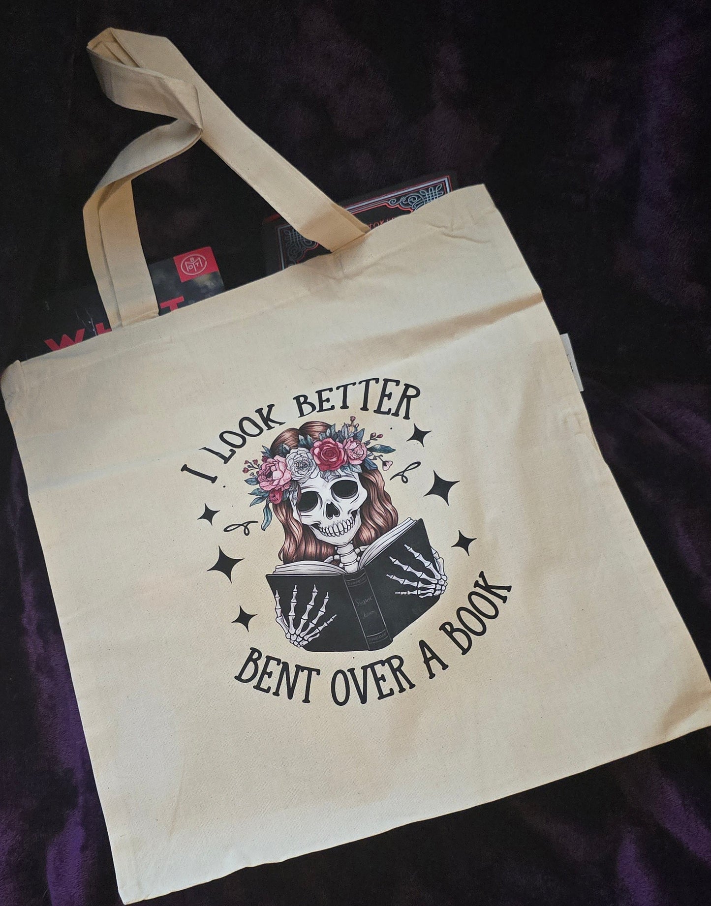 Bent Over a Book Canvas Tote Bag